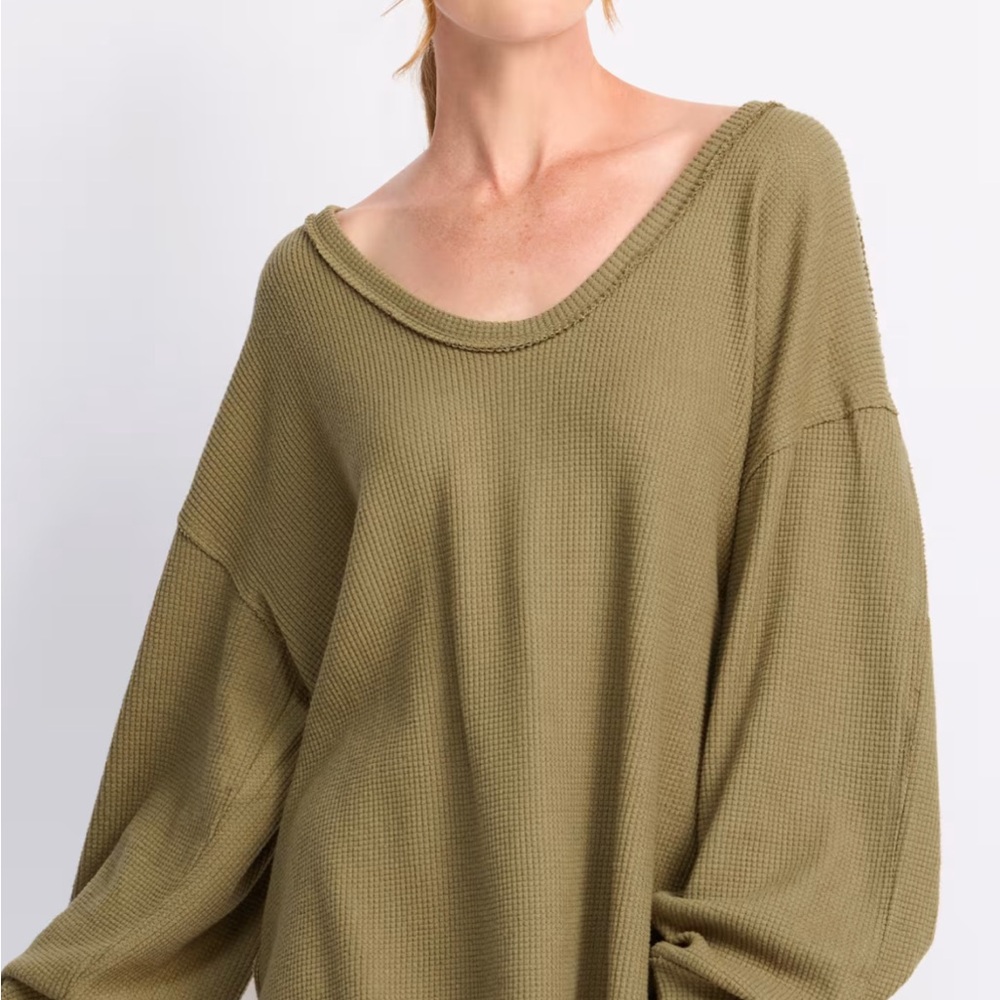 Oversized thermal top with vintage inspired waffle knit.